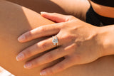 with her hand facing to the left the model is wearing the sterling silver coffee bean ring